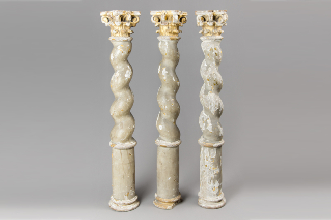 An 18th century set of Italian baroque gilt wood twisted columns. Price realised £500