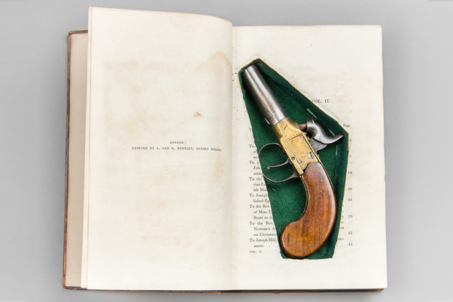 A 19th century percussion pocket pistol contained in "Cowper's Private Correspondence Vol 2" by Christopher Henry Oldham Scaife. Price realised £300