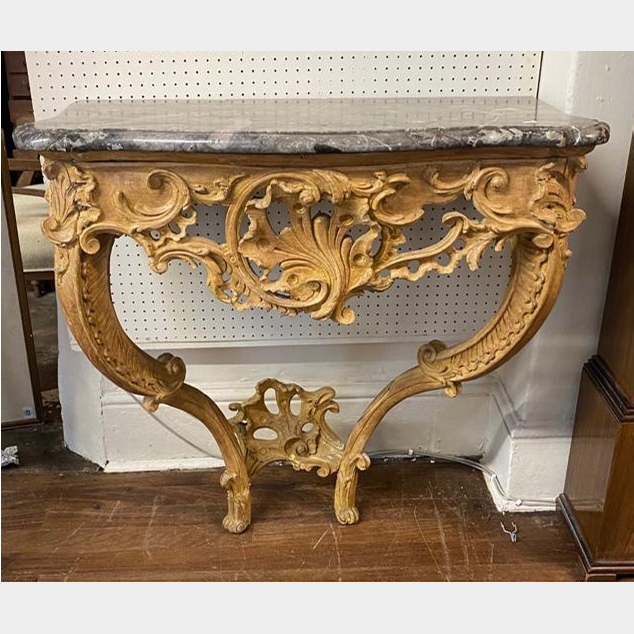 A 19TH CENTURY CARVED FRUITWOOD CONSOLE TABLE