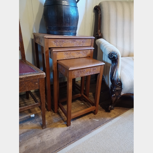 SOLD  Nest of carved wooden tables