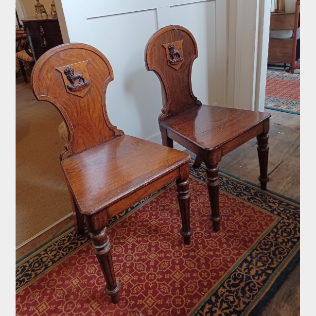 Pair of carved hall chairs