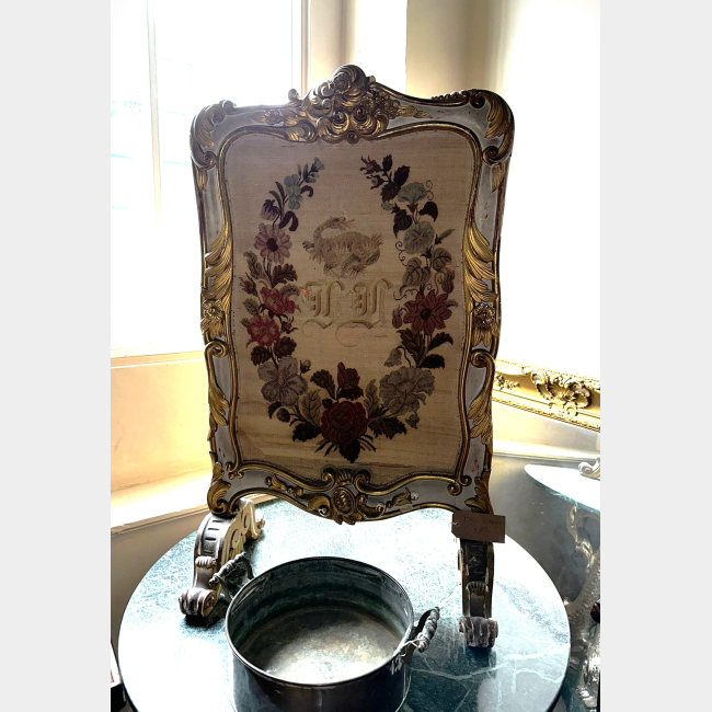 Embroidered fire screen