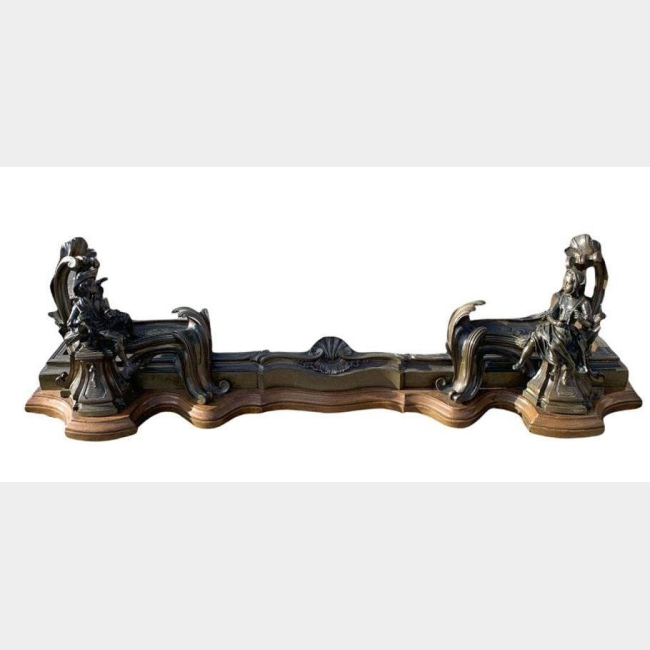 A good 19th century french bronze figural fire curb