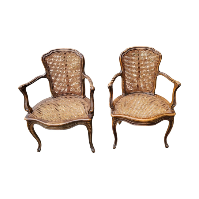 A Pair Of Mid 20th Century French Beechwood Open Armchairs Raised On Cabriole Legs.